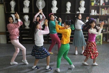 The girls become close friends through song, dance and school life