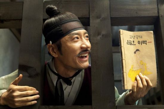 K tries to use illustrated pornography to solve his predicament