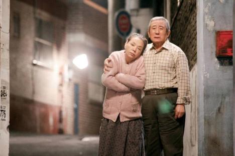 Goon-bong and his wife appear with dignity in the high-angled shot Goon-bong and his wife appear with dignity in the high-angled shot