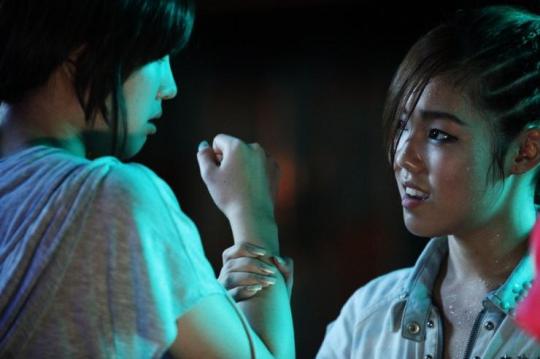 Tension escalates between the members as they vie to be lead singer