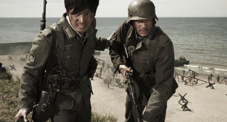 On the beaches of Normandy, Joon-sik and Tatsuo do all they can to survive