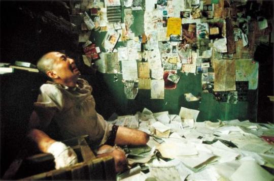 Battered and bruised, Man-shik attempts to discover Byeong-gu's secrets