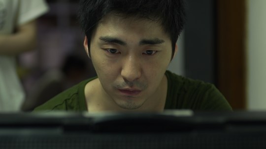 Hae-gang's intense passion for filmmaking creates conflict in his professional and private life