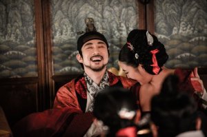 An erotic love triangle features